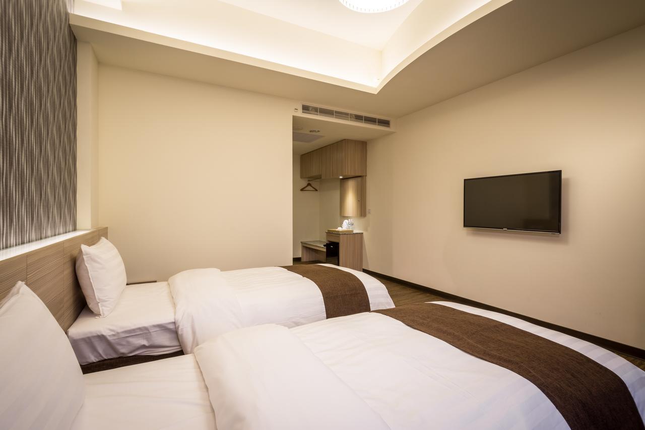 Midu Business Hotel Xiluo Luaran gambar