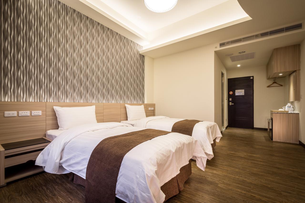 Midu Business Hotel Xiluo Luaran gambar