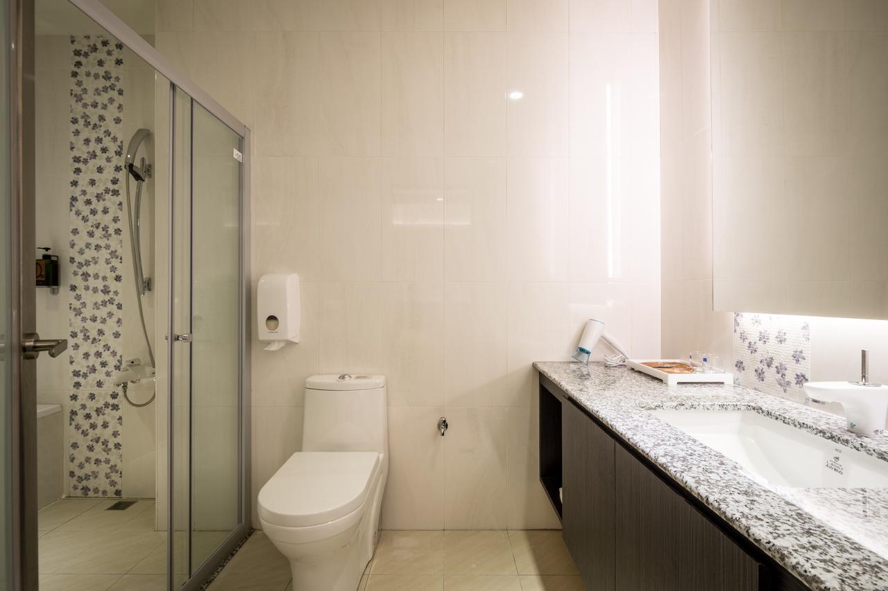 Midu Business Hotel Xiluo Luaran gambar