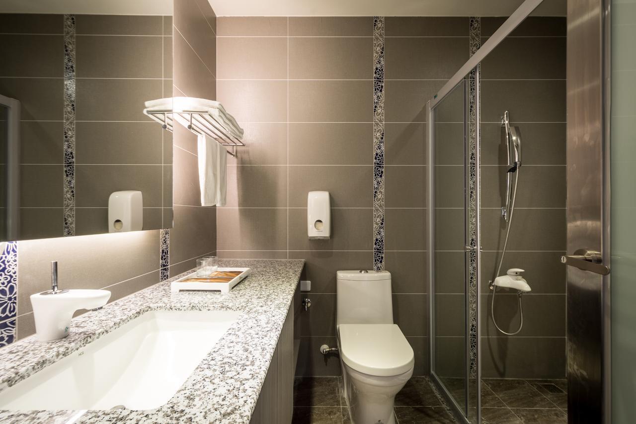 Midu Business Hotel Xiluo Luaran gambar