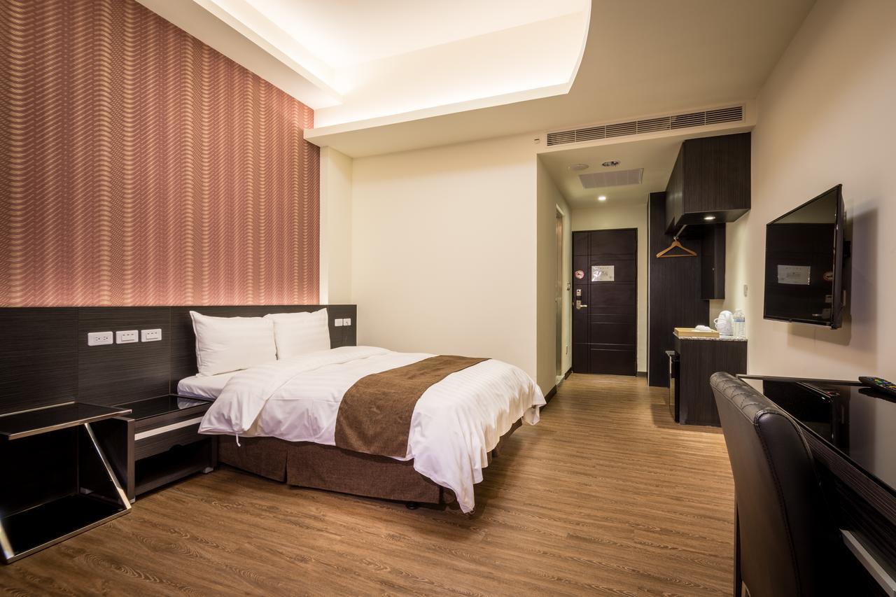 Midu Business Hotel Xiluo Luaran gambar
