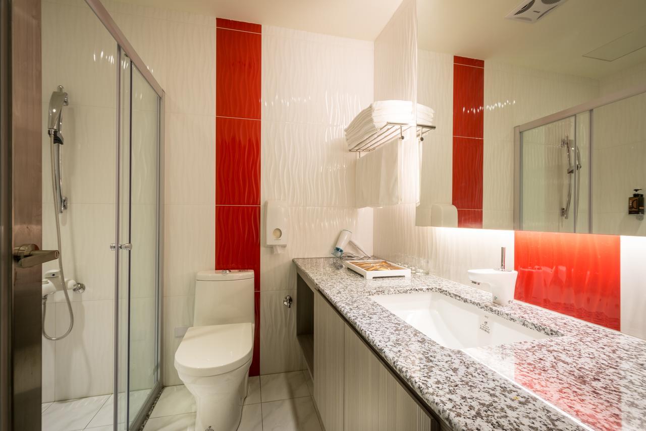 Midu Business Hotel Xiluo Luaran gambar