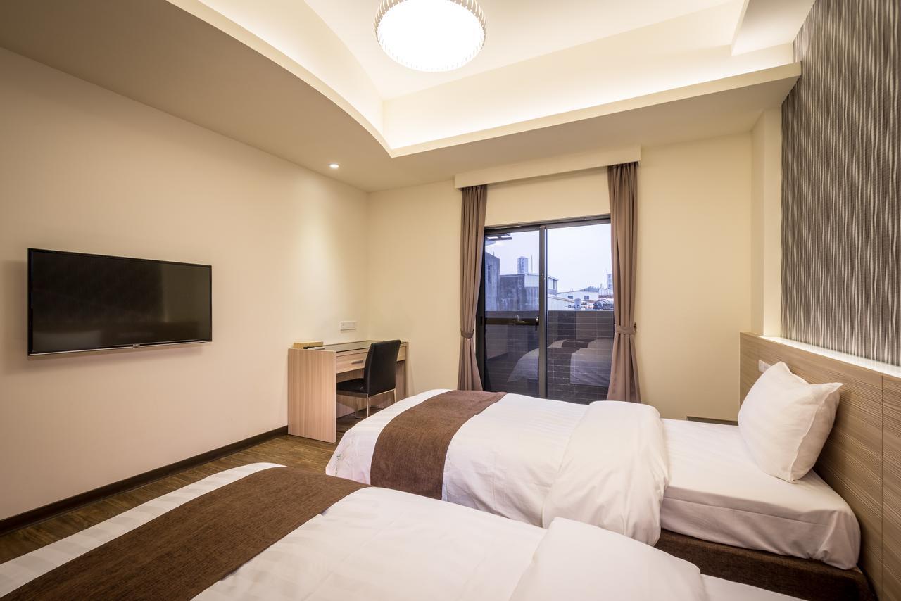 Midu Business Hotel Xiluo Luaran gambar
